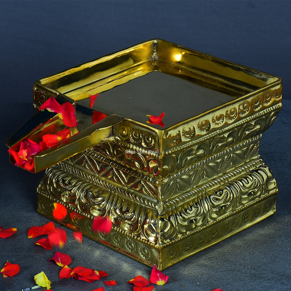 Abishega Beedam pedestal close up angle view with red rose petals for divine abhishekam pooja