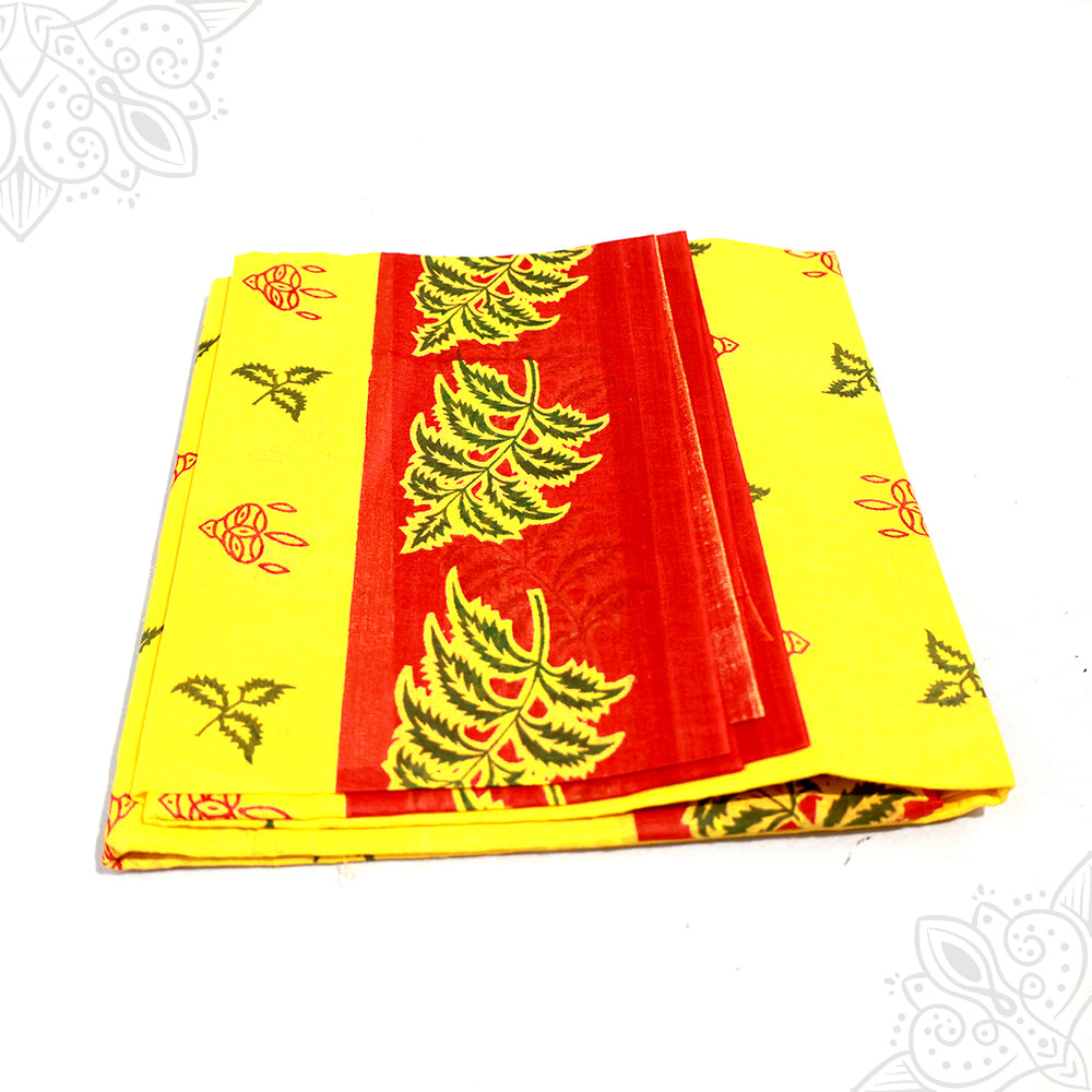 Amman veppillai saree folded in yellow and red with neem leaf print slight right side angle for deity offering