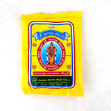Anantha Vilas vibhuti pack in a slight right side angle view showing the yellow cover with Murugan design for pooja use