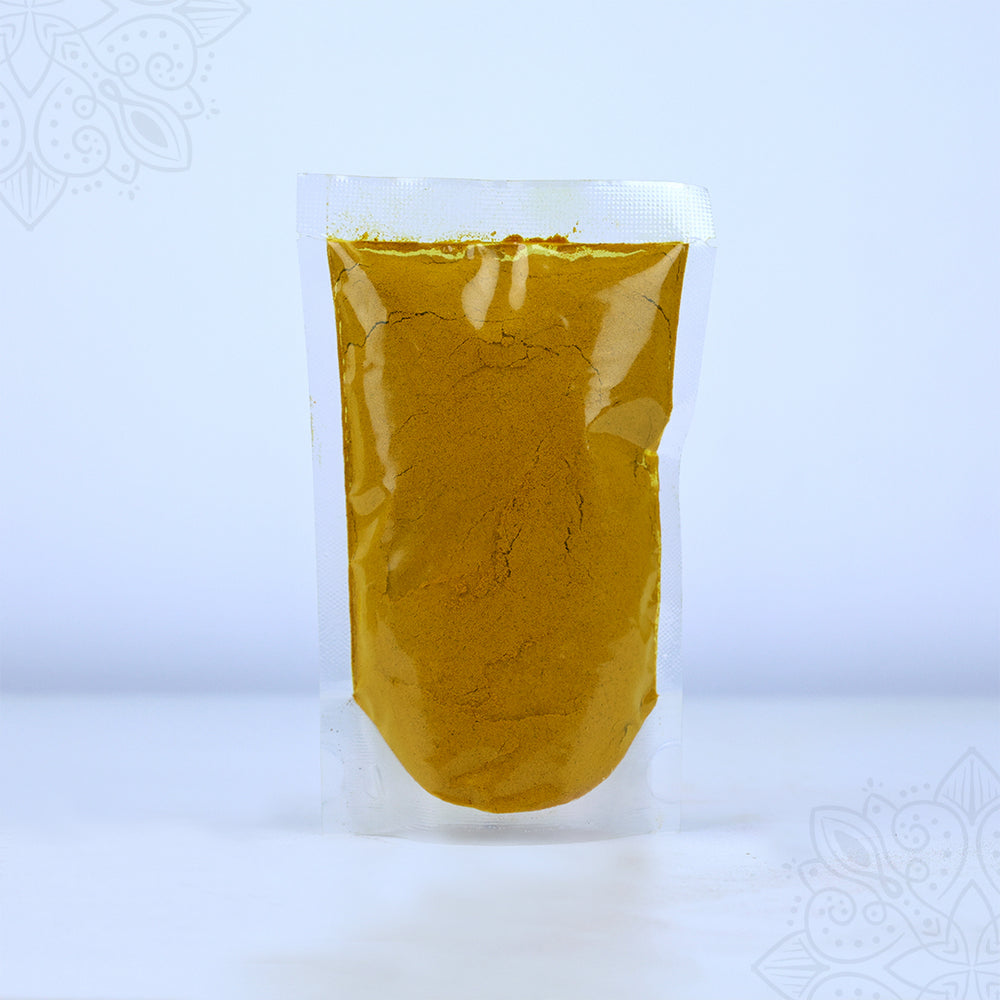 Kasthuri manjal powder 250g in a clear sealed pouch showing golden yellow turmeric powder in wider front view against a white backdrop.