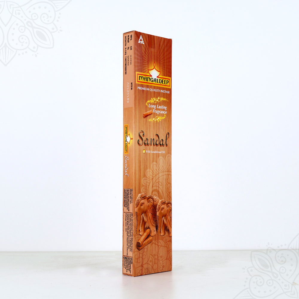 Side angle view of Mangaldeep sandal agarbatti box showing back and side label on brown pack against white background