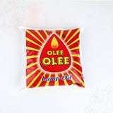 Olee lamp oil 500ml pouch with red and yellow packaging straight top angle view for daily pooja lamp use