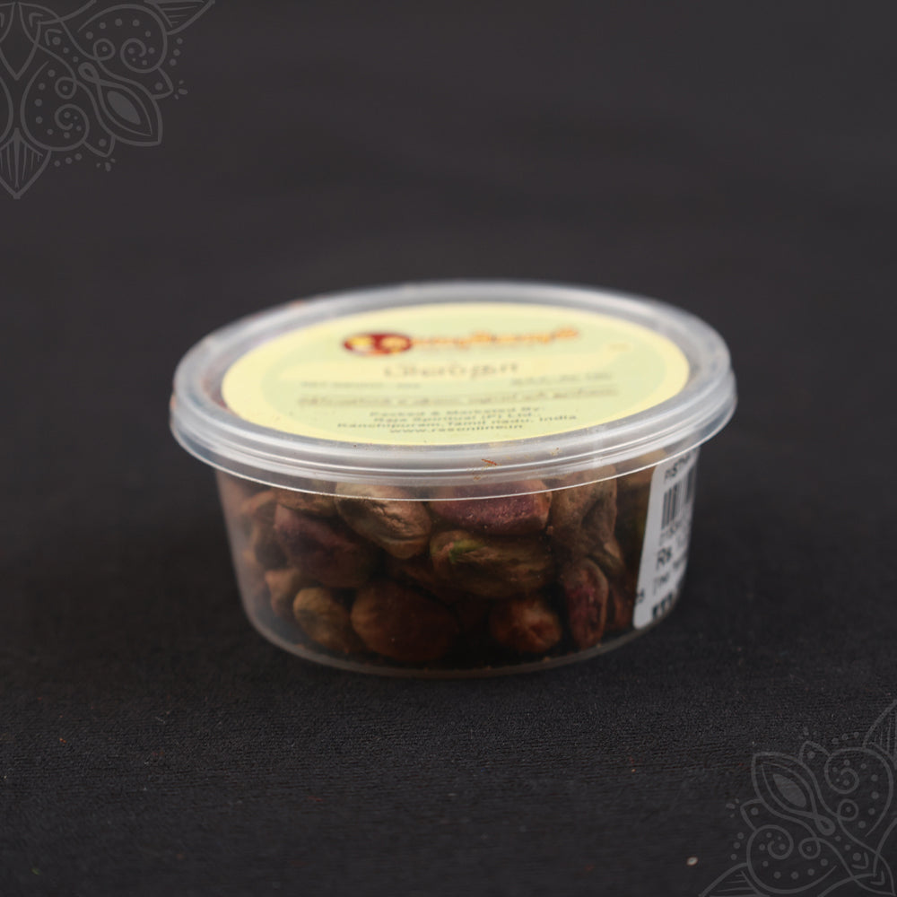 Subamangalam pista pack side angle view showing pistachios clearly through clear container