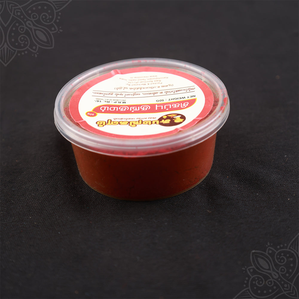 Subamangalam red kumkum 50g pack top angle view showing bright red paste inside container
