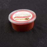 Subamangalam red kumkum 50g pack top angle view showing bright red paste inside container