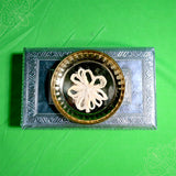 Thamarai thandu thiri wick in flower shape kept in metal plate on silver stool top view