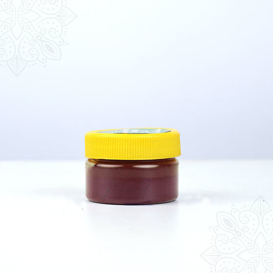 Thazhampoo kumkum box small jar with yellow cap straight front view ideal for daily pooja and tilak use