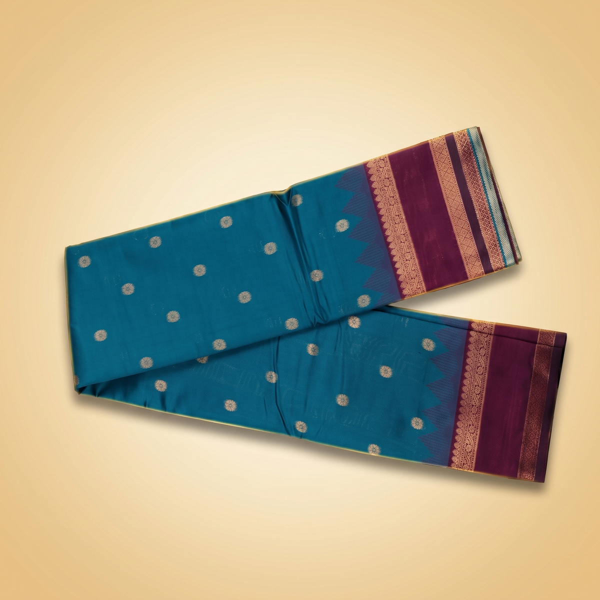 Amman soft silk saree temple border in peacock blue with small motifs and purple zari temple border, laid flat straight top view.
