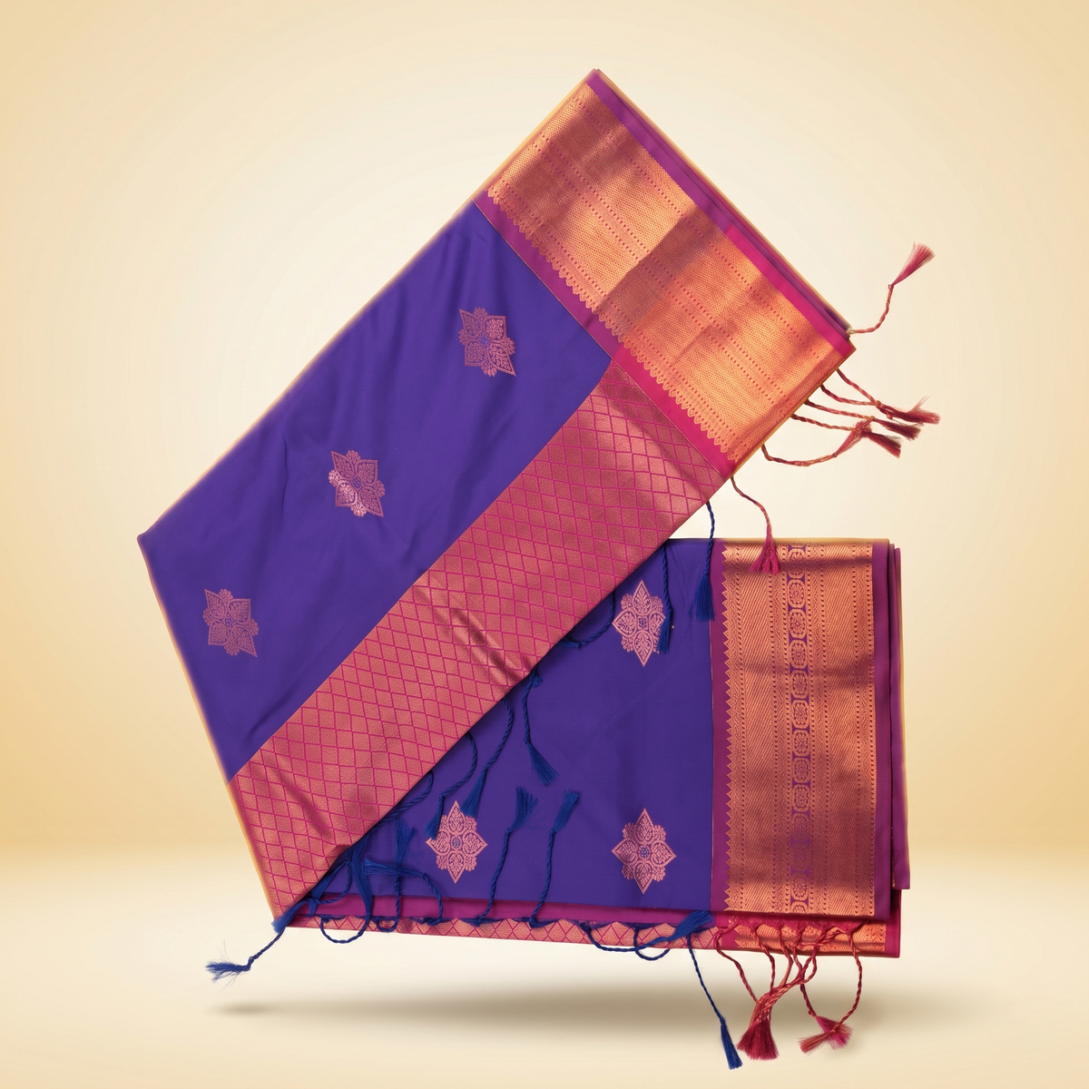 Amman soft silk saree special in violet with golden zari pallu, floral motifs and tasseled edges, laid flat straight top view.