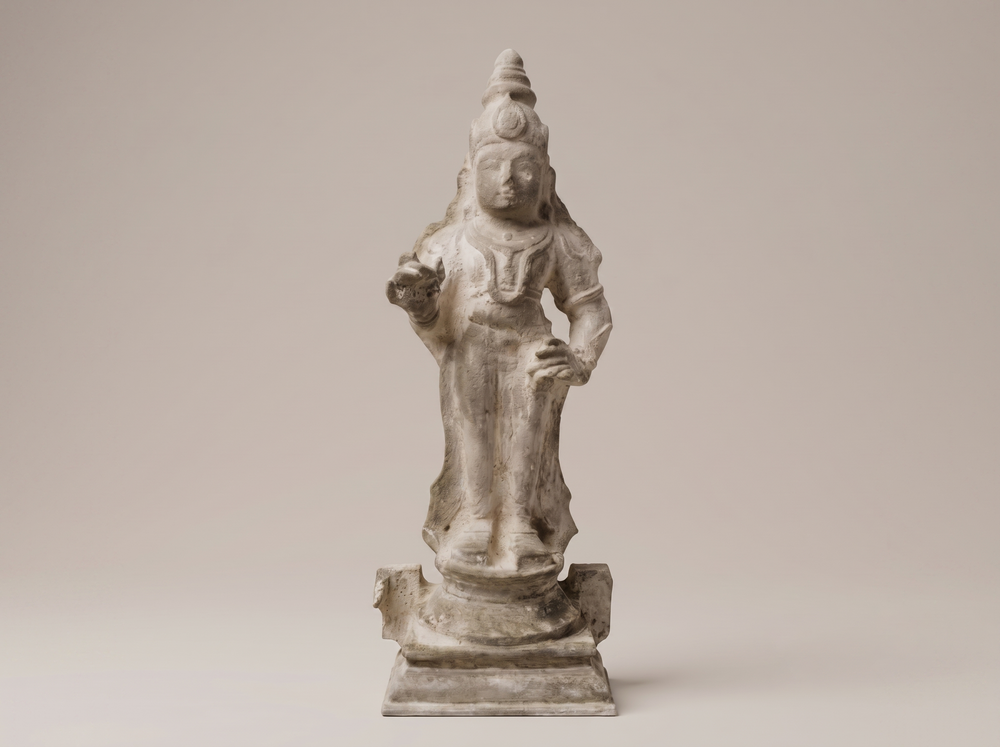 Hand-sculpting divine form, jewelry, and intricate thiruvachi detailing