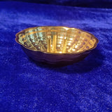 Agarbathi stand plate flower shaped bowl front close view kept on blue velvet cloth for daily pooja