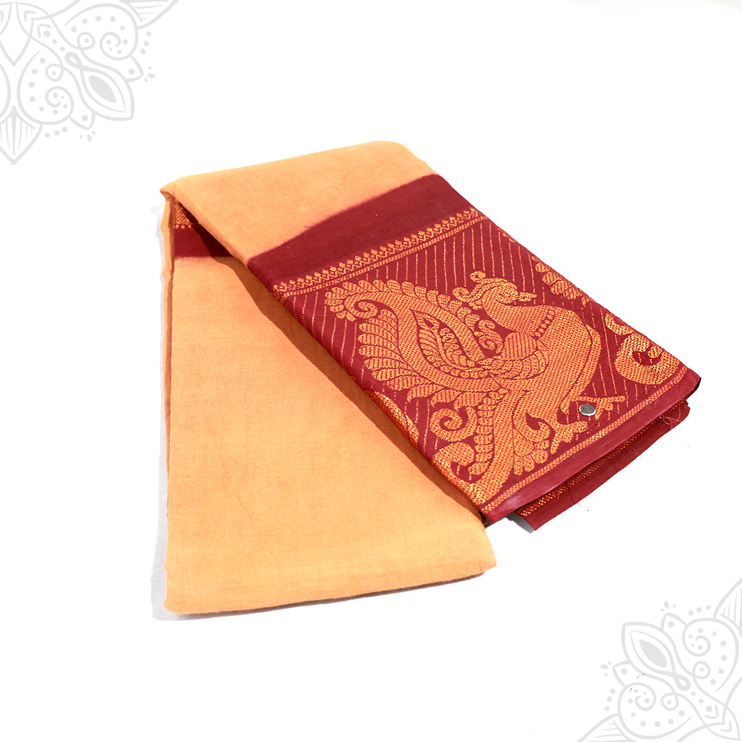 Amman saree cotton with 9 inch maroon peacock zari border, brown body folded neatly, slight side angle view on white background