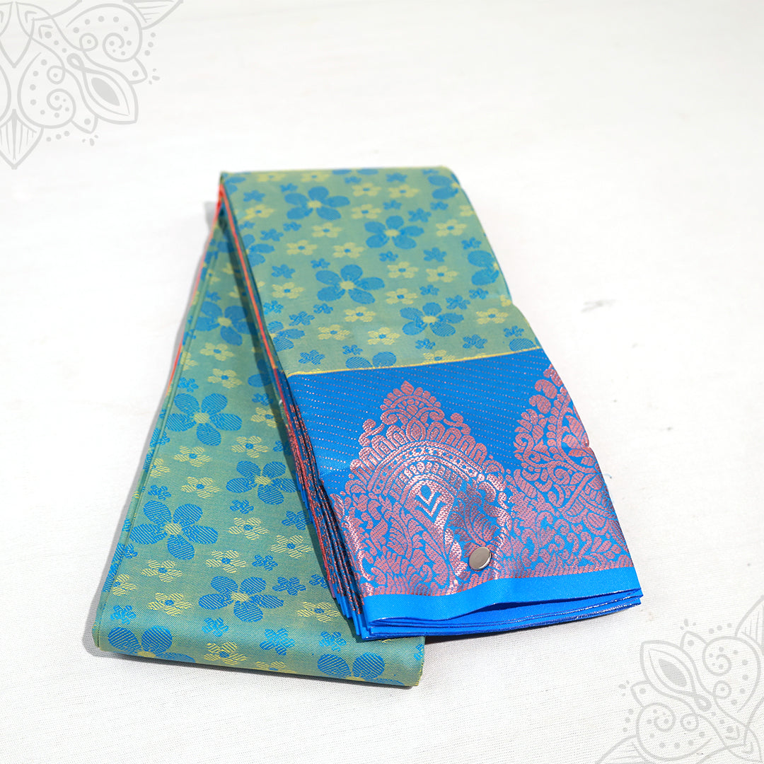 Amman saree embose green floral with blue paisley border folded view for goddess idol decoration