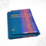 Blue amman saree pure cotton with orange and gold medium border folded neatly side angle view for daily pooja wear