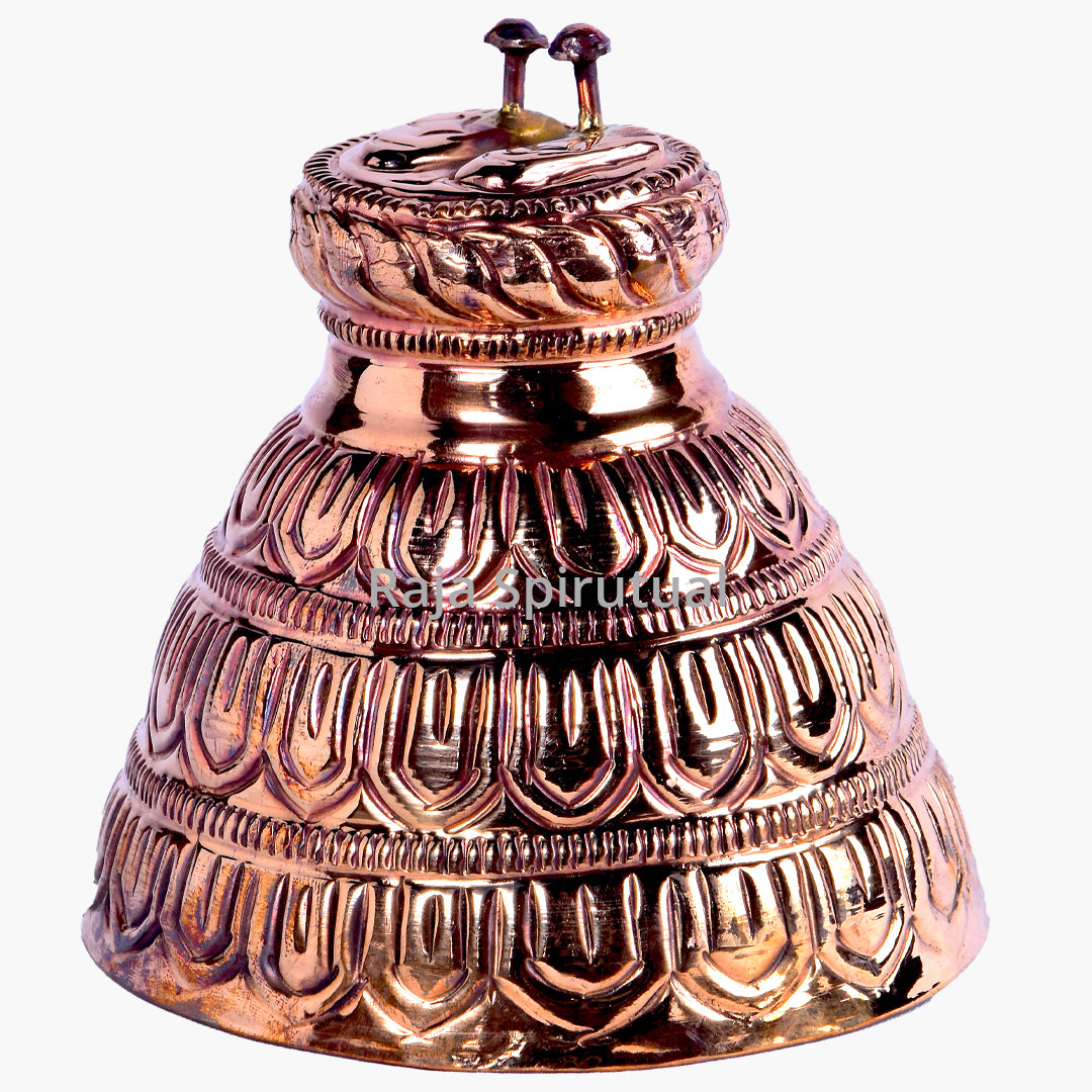 Copper coating sadari with an ornate embossed design and a decorative lid shown from the front