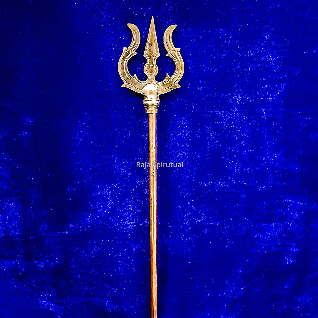 Copper pattai sulam trishul with hooked prongs and large round knob on full copper handle on blue velvet background, straight front view