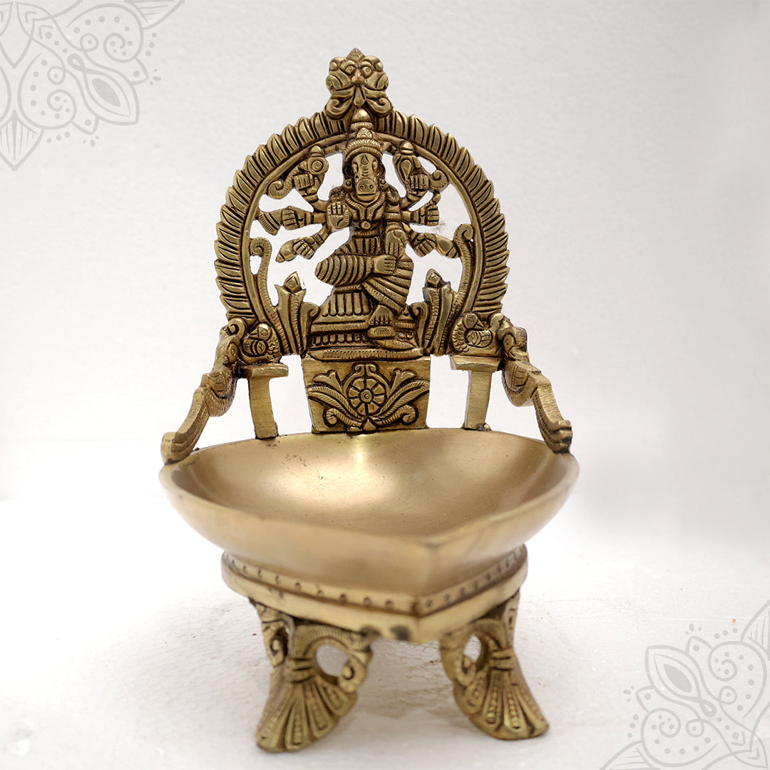 Fancy Varahi Amman vilakku straight front view deity in prabhavali with wide oil basin on carved four legged base
