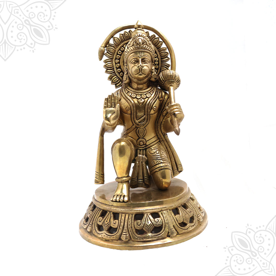 Hanuman idol kneeling with blessing hand and gada in straight front view on carved round base