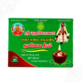 Herbolite mooligai deepam green box straight front view with Lakshmi image and lit lamp for daily pooja