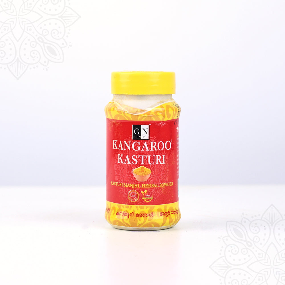 Kangaroo kasthuri manjal powder bottle straight front view with yellow lid for daily pooja and skincare use