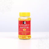 Kangaroo kasthuri manjal powder bottle straight front view with yellow lid for daily pooja and skincare use