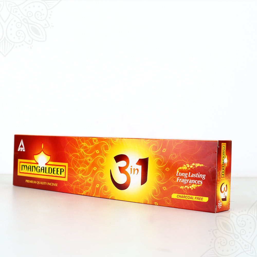Mangaldeep 3in1 agarbatti charcoal free incense sticks red box shown in straight front lying view with right end visible against white backdrop.