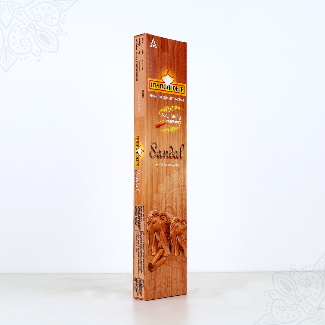 Side angle view of Mangaldeep sandal agarbatti box showing back and side label on brown pack against white background