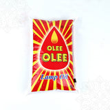 Olee lamp oil 1 litre pouch with red and yellow packaging straight top angle view for daily pooja lamp use