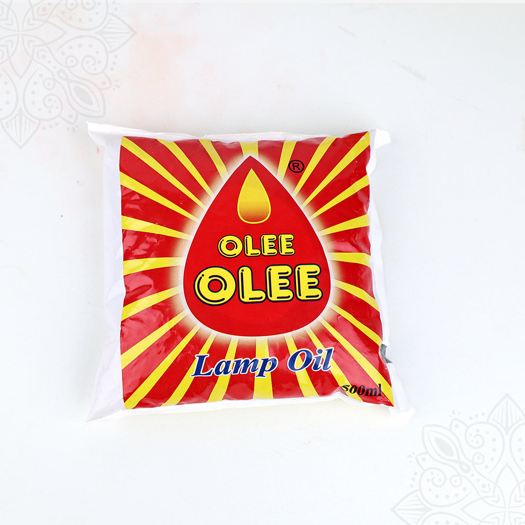 Olee lamp oil 500ml pouch with red and yellow packaging straight top angle view for daily pooja lamp use