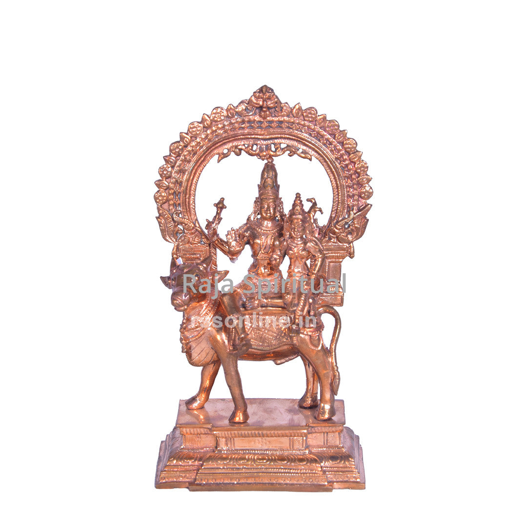 Panchaloga Prathosha Moorthy seated on bull holding sword, flame halo arch, tiered stepped base, straight front view