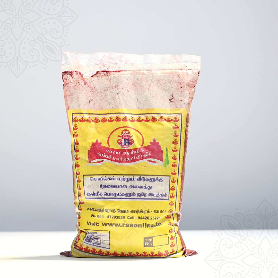 Raja Aanmeegam red kumkum bulk packet with Tamil label in front view slightly leaning left against a grey backdrop.