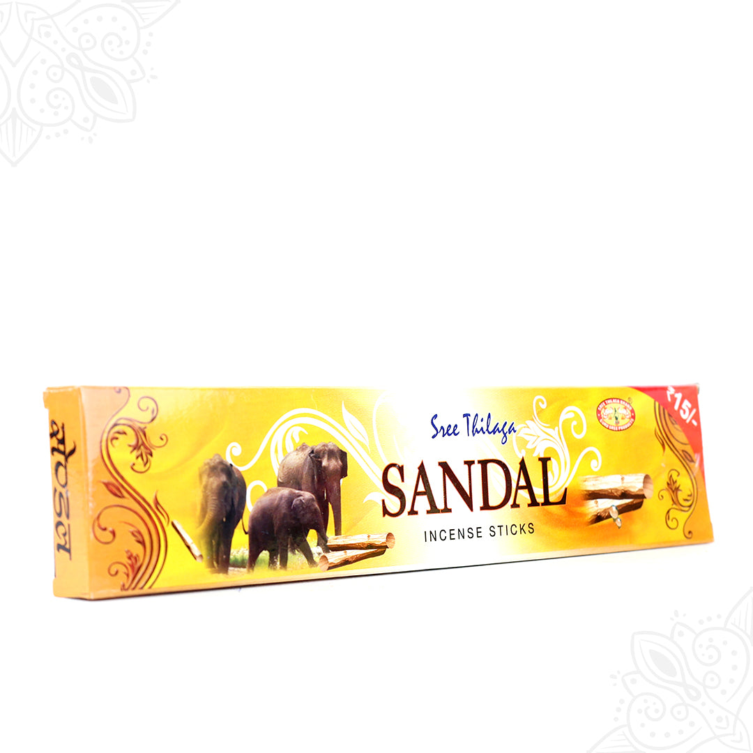 Sree Tilaga sandal agarbatti incense sticks yellow box with elephant design on white background, slight left side angle view