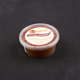Subamangalam meroon kumkum paste container slight top angle view for daily pooja use
