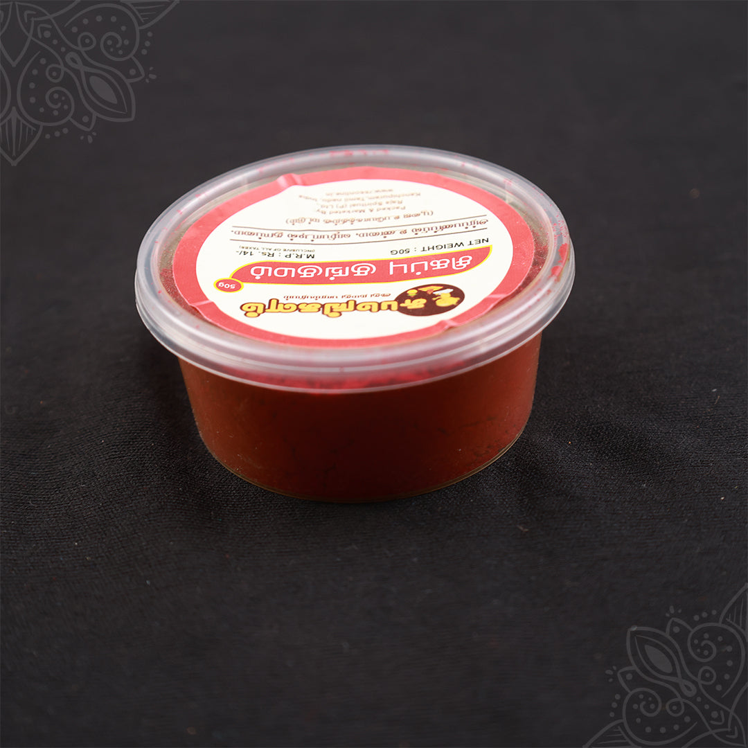 Subamangalam red kumkum 50g pack top angle view showing bright red paste inside container