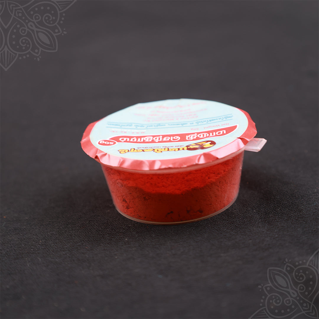 Subamangalam senthuram powder pack slight top angle view showing bright red powder inside