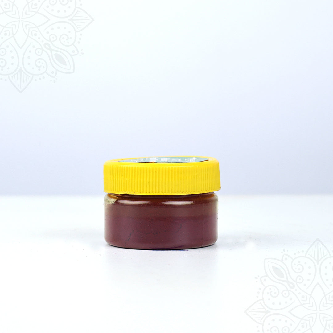 Thazhampoo kumkum box small jar with yellow cap straight front view ideal for daily pooja and tilak use