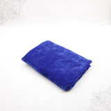 Blue velvet cloth 1 meter folded neatly on white background side angle view for pooja decoration